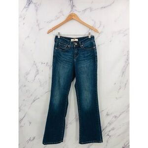 O013 Levi’s 512 Perfectly Slimming Bootcut Distressed Denim Jeans